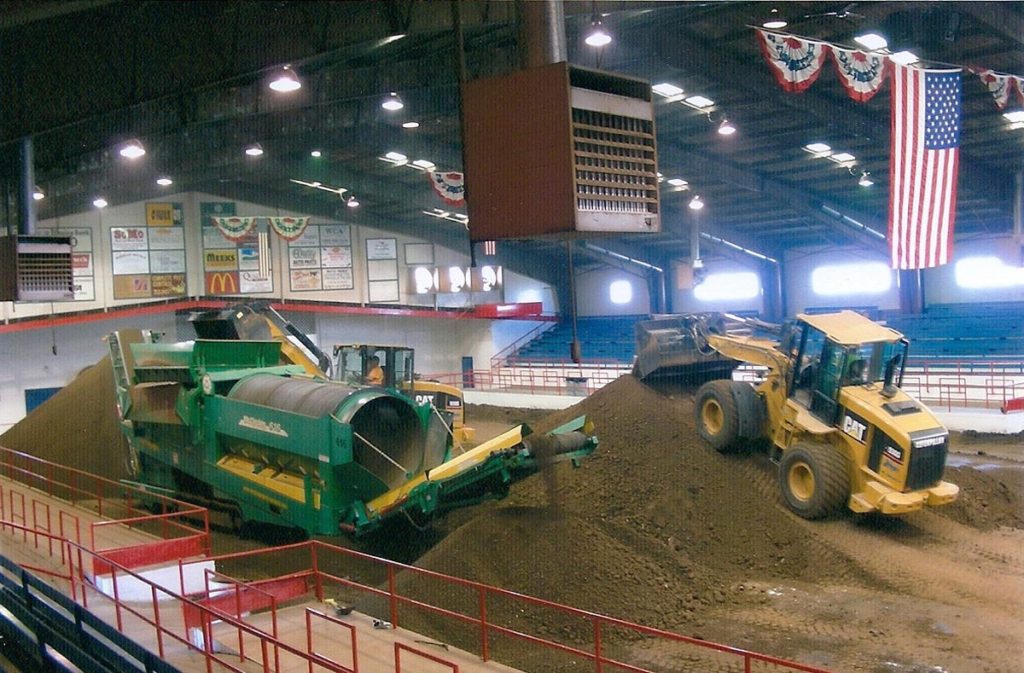 Screening-dirt-in-arena2 Ozark Empire Fairgrounds Dirt Screen by Gillespie Excavating